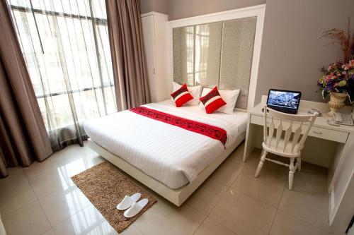Letto o letti in una camera di Hope Land Hotel 46/1