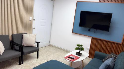 Μια τηλεόραση ή/και κέντρο ψυχαγωγίας στο Departamento en el centro