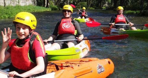 a group of people in kayaks on a river at Quinta Lamosa Agroturismo in Arcos de Valdevez