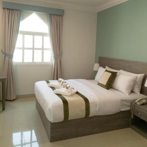 Katil atau katil-katil dalam bilik di Sovereign Hotel - Marriage Certificate Required