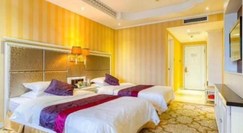 Katil atau katil-katil dalam bilik di Changchun Global Hotel