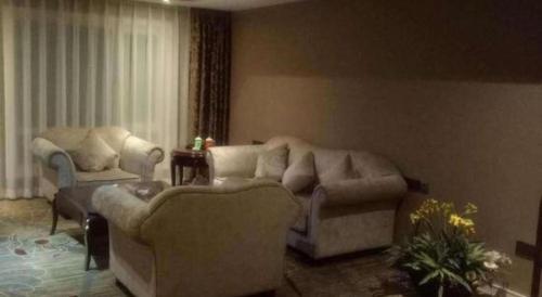 Χώρος καθιστικού στο Metropark Hotel
