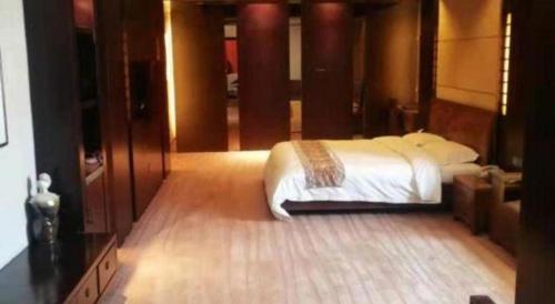 Ένα ή περισσότερα κρεβάτια σε δωμάτιο στο Metropark Hotel