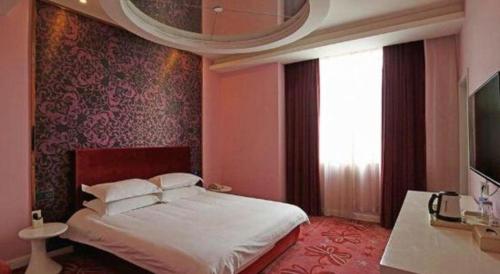 a bedroom with a bed and a large window at TO915101 STILL LOVE THEME HOTEL in Chengdu