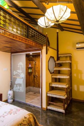 Ένα ή περισσότερα κρεβάτια σε δωμάτιο στο The Courtyard Suzhou Inn Hemu Branch