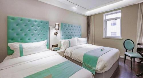 Katil atau katil-katil dalam bilik di Xana Lite Shenyang Beiling Park Liaoning Building Branch