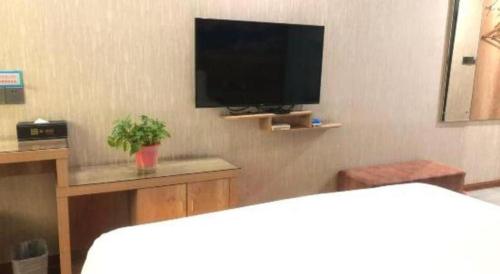 Μια τηλεόραση ή/και κέντρο ψυχαγωγίας στο PAI Hotel·Linfen Hongdong Lily Town