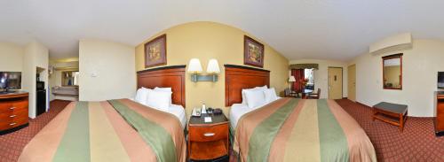 Ένα ή περισσότερα κρεβάτια σε δωμάτιο στο Americas Best Value Inn - Brookhaven