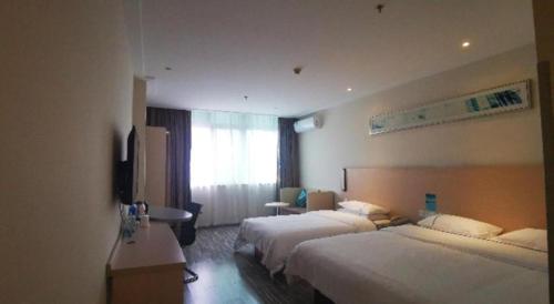 Letto o letti in una camera di City Comfort Inn Nanning Wuyi Road Department of Motor Vehicles