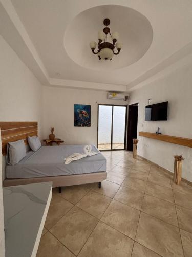 Postel nebo postele na pokoji v ubytování Hotel Remanso Beach