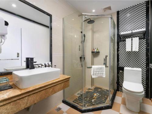 Ένα μπάνιο στο Borrman Hotel Huizhou Danshui High-speed Railway Huiyang Station