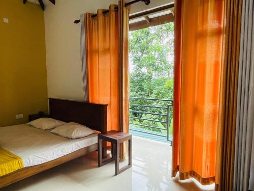 Giường trong phòng chung tại Namal Residence & Restaurant