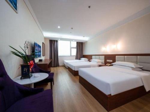 Postel nebo postele na pokoji v ubytování Bashan Hotel