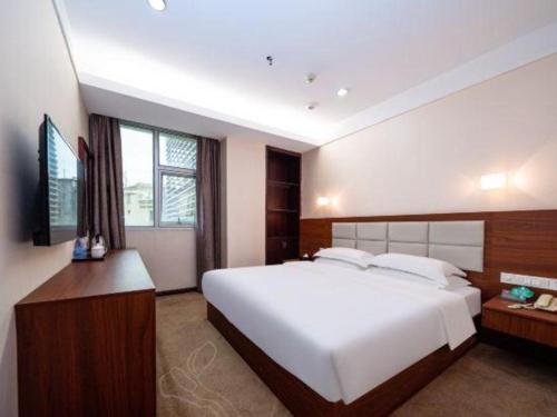 TV a/nebo společenská místnost v ubytování Bashan Hotel