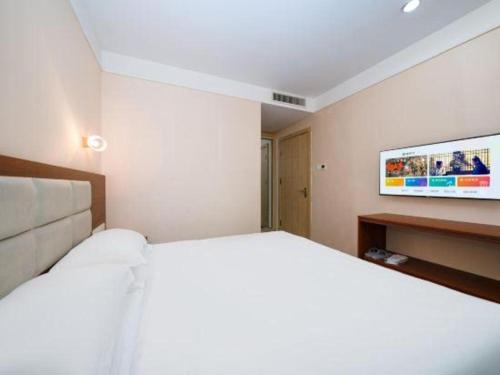 Postel nebo postele na pokoji v ubytování Bashan Hotel