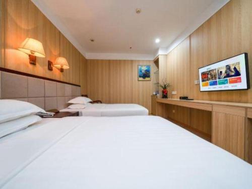Postel nebo postele na pokoji v ubytování Bashan Hotel
