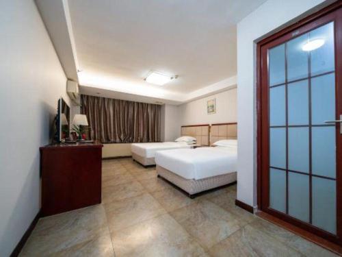Postel nebo postele na pokoji v ubytování Bashan Hotel