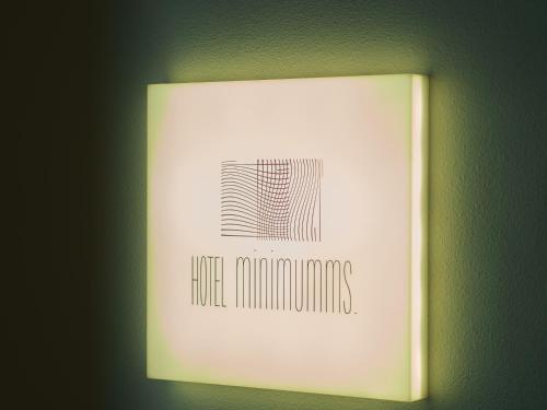 a picture of a book with the text hello mountains at HOTEL minimumms女性専用カプセルホテルWomen only hotel in Naha