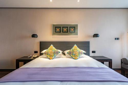 Katil atau katil-katil dalam bilik di SSAW Boutique Hotel Hangzhou Xiaoshan Yinlong Hangfachang Subway