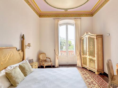 Ένα ή περισσότερα κρεβάτια σε δωμάτιο στο Hotel Palou 1874