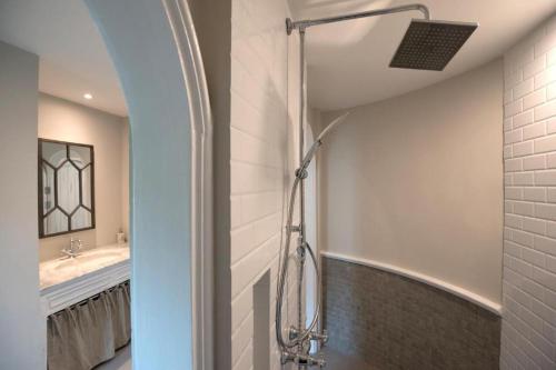 a bathroom with a shower and a sink at The Bluesky Resort @ Khao Kho in Campson