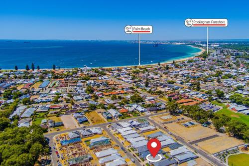 an aerial view of a city with a beach at Bright & Airy 3-Bed House Near Rockingham Beach in Rockingham