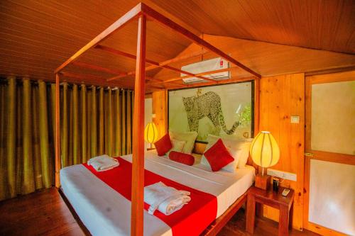 Ein Bett oder Betten in einem Zimmer der Unterkunft Lowin Yala