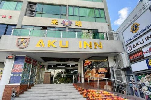 a aku inn sign on the front of a building at Aku Inn Cebu City in Cebu City