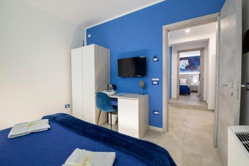 Телевизор и/или развлекательный центр в Civico 31 Luxury rooms