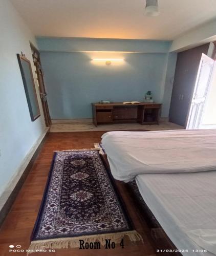 Cama o camas de una habitación en Ronglyang Villa Homestay Near MG Road