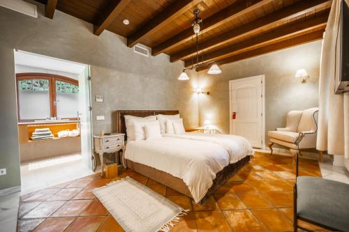 Postel nebo postele na pokoji v ubytování CASA TESS boutique hotel
