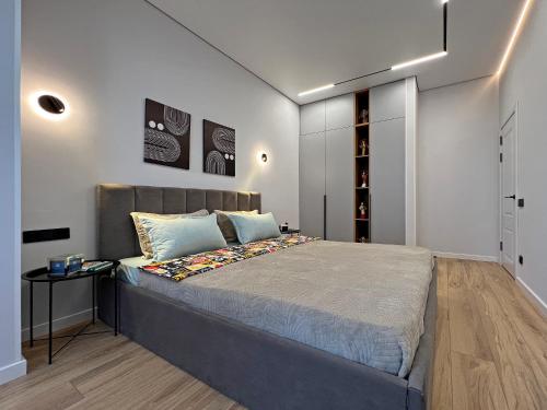 Katil atau katil-katil dalam bilik di Charming mountain view apart