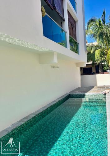 Sunset Apt moderne à 2 min de la plage, clim, piscine