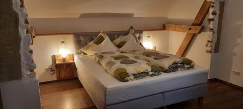 Ένα ή περισσότερα κρεβάτια σε δωμάτιο στο Ferienhaus Rötzer - Forsthausschmankerl