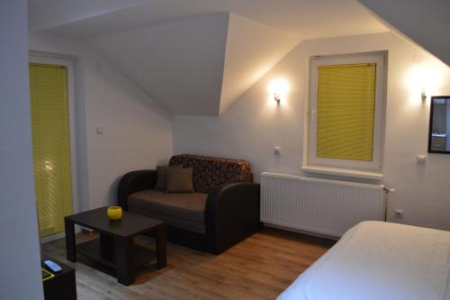 Ένα ή περισσότερα κρεβάτια σε δωμάτιο στο Hestia Apartments