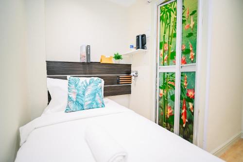 Katil atau katil-katil dalam bilik di Swing & Pillows - Sungei Wang Bukit Bintang