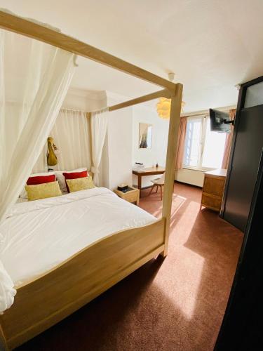 Llit o llits en una habitació de Tripel B