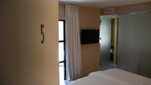 Katil atau katil-katil dalam bilik di CASA TESS boutique hotel