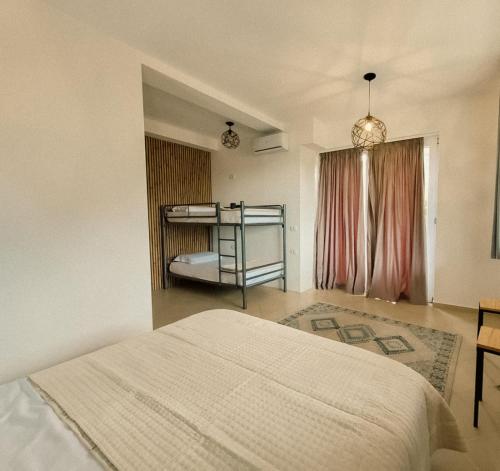 Ένα ή περισσότερα κρεβάτια σε δωμάτιο στο Camera 4 letti in villa in campagna