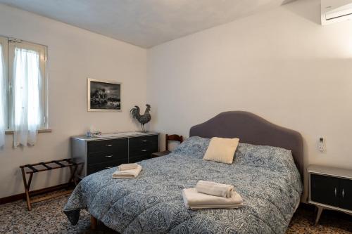 Ένα ή περισσότερα κρεβάτια σε δωμάτιο στο Casa Simi - Holiday Home