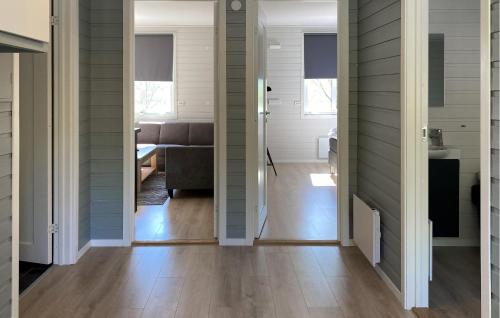 a hallway of a house with a living room at Amazing Home In Ørsta With Wifi in Ørsta