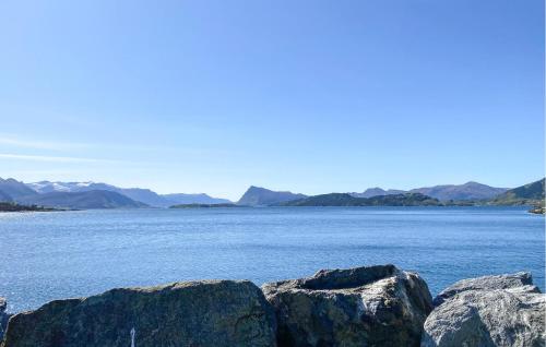 a view of a large body of water with rocks at Amazing Home In Ørsta With Wifi in Ørsta