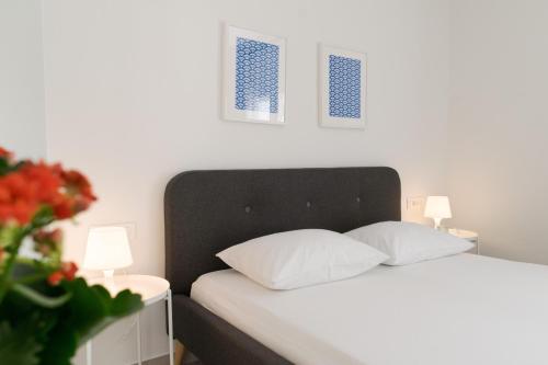 Katil atau katil-katil dalam bilik di Arba apartmani