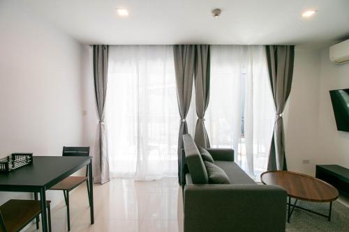 Χώρος καθιστικού στο Mantra Beach Condominium Suite 2 - Mae Phim