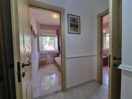 a hallway with a door leading to a room at Villa Anna by Holiday World in Ravanusa