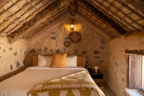 Postel nebo postele na pokoji v ubytování Hatta Village Lodges - Ophiolite