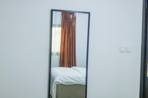 Postel nebo postele na pokoji v ubytování KK Lodging Yaounde Fouda