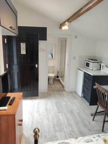 a kitchen with a sink and a counter top at Lingwood Hall in Lingwood