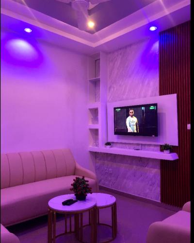 Noukpo Appartement Meublé TV 또는 엔터테인먼트 센터