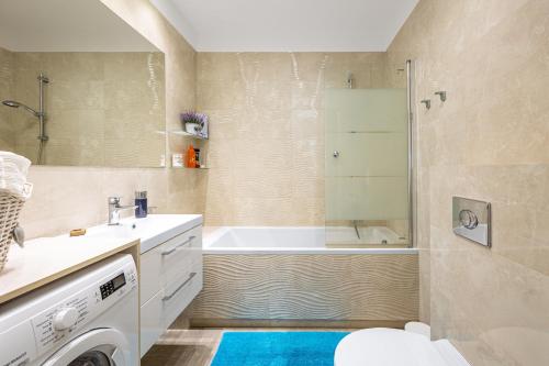 Kúpeľňa v ubytovaní Luxury Apartment Bursztynowa